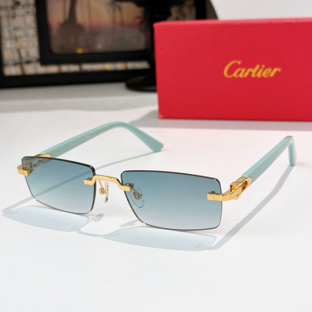 Cartier eyeglasses with light teal frame and gold accents, rectangular blue-tinted lenses
