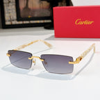 Cartier eyeglasses with cream frame and gold hinges, rectangular dark lenses
