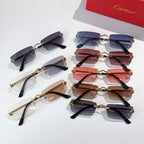 Assorted Cartier glasses with metal frames and tinted lenses in blue, pink, brown, and black.