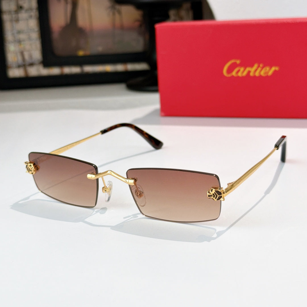 Cartier glasses with gold frame, tan tinted lenses, black temples, rectangular silhouette.