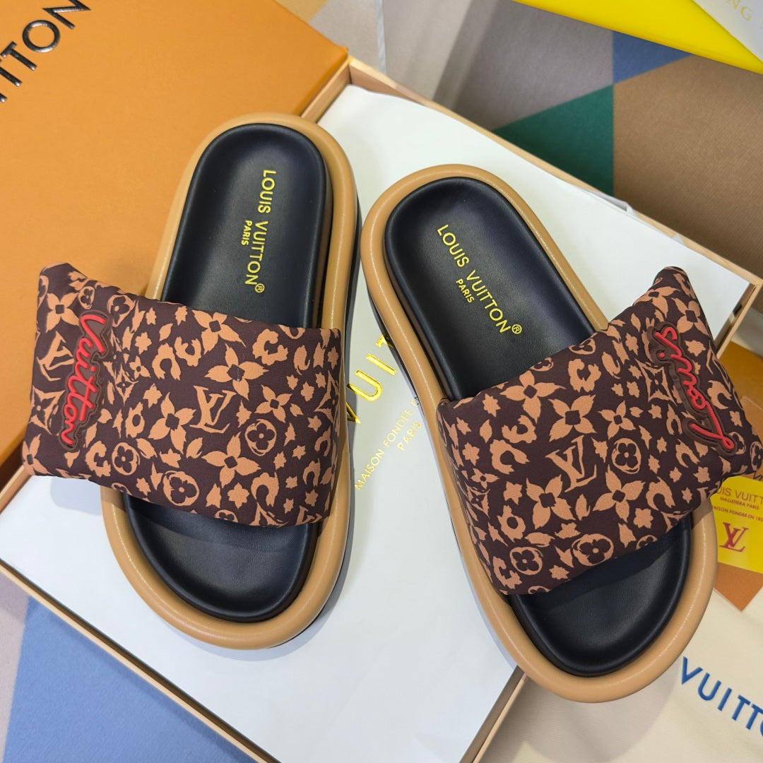 Louis Vuitton sandals in box, pair of brown monogram slides with black footbeds and tan soles