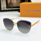 Louis Vuitton cat-eye sunglasses with dark lenses and gold chain strap detail