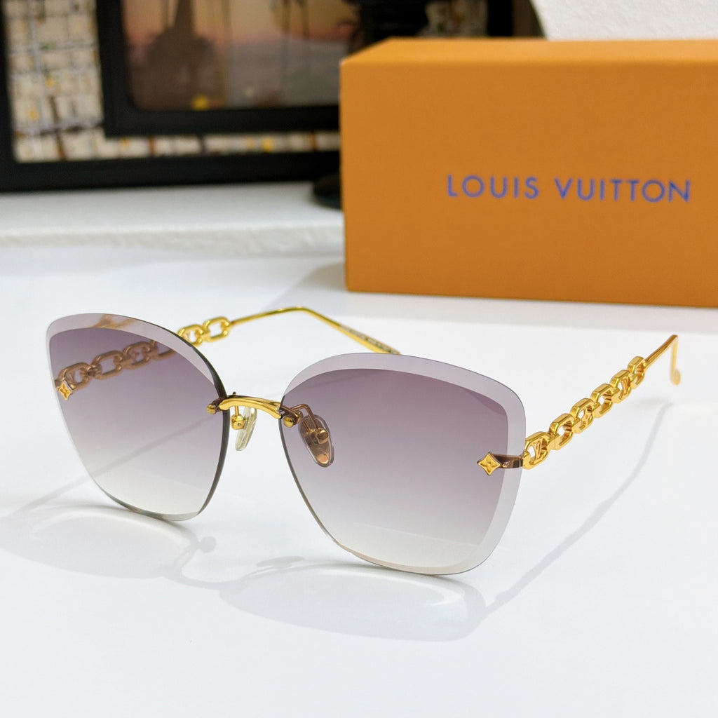 Louis Vuitton cat-eye sunglasses with light purple gradient lenses and gold chain strap