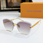 Louis Vuitton cat-eye sunglasses with light purple gradient lenses and gold chain strap
