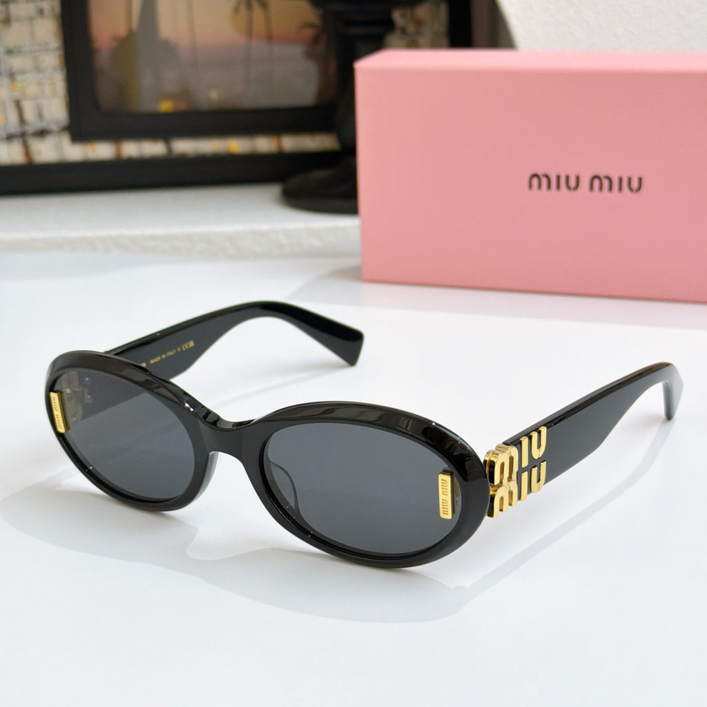 Black oval sunglasses with dark lenses and gold logo on temples