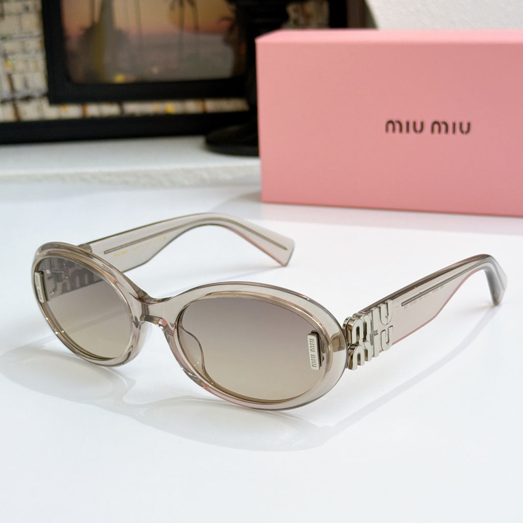 Transparent oval sunglasses with light-tinted lenses and gold logo on temples