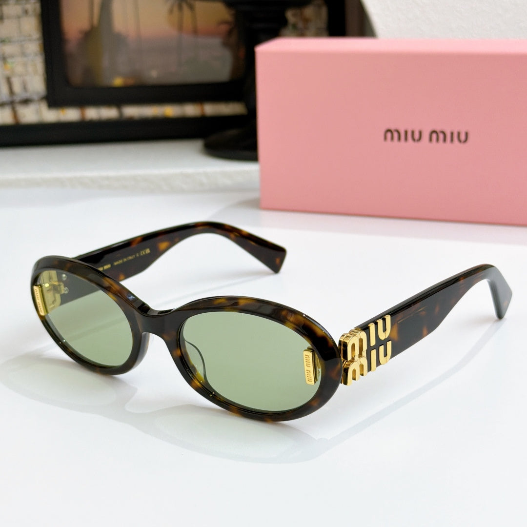 Tortoise oval sunglasses with dark green lenses and gold logo on temples