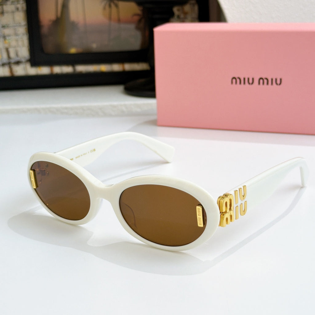 White oval sunglasses with brown lenses and gold logo on temples