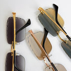 Cartier glasses close-up with mixed gold and dark frames and tinted lenses