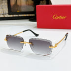 Cartier glasses with gold frames and smoky gray gradient lenses, metal temples