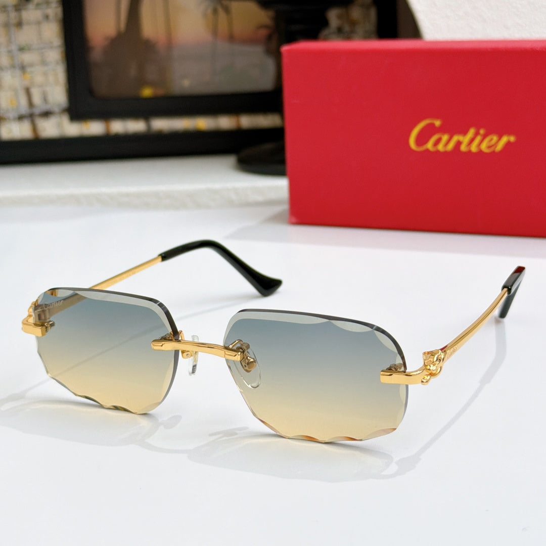 Octagonal tinted sunglasses with gold frames and pale gold lenses, black temple tips.