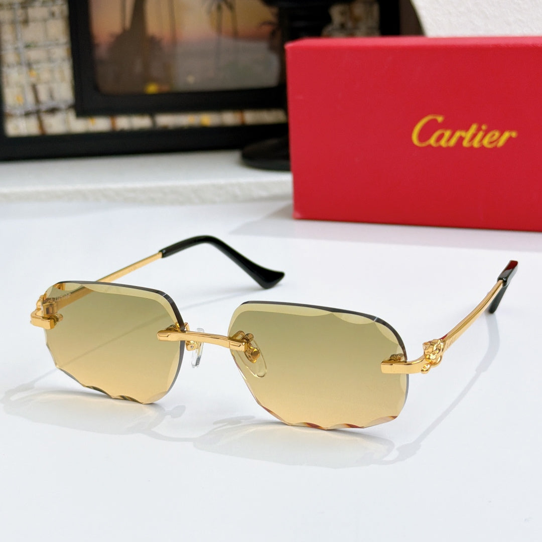 Octagonal tinted sunglasses with gold frames and amber lenses, black temple tips.