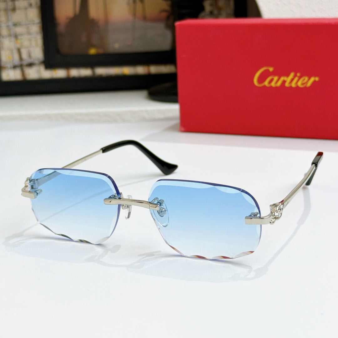 Octagonal tinted sunglasses with gold frames and light blue lenses, black temple tips.