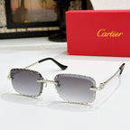 Gold metal sunglasses with dark lenses and black temples