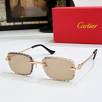 Gold metal sunglasses with tan lenses and black temples