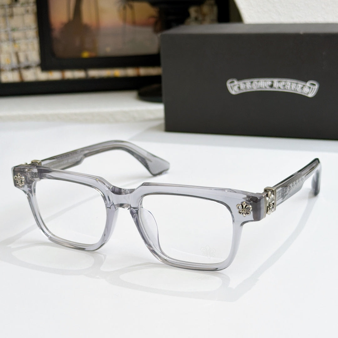 Clear frame chrome eyeglasses with silver-tone arms and small metal side emblem