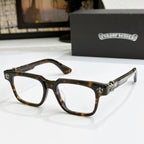 Tortoise shell frame chrome eyeglasses with gold-tone arms and fleur-de-lis hinge