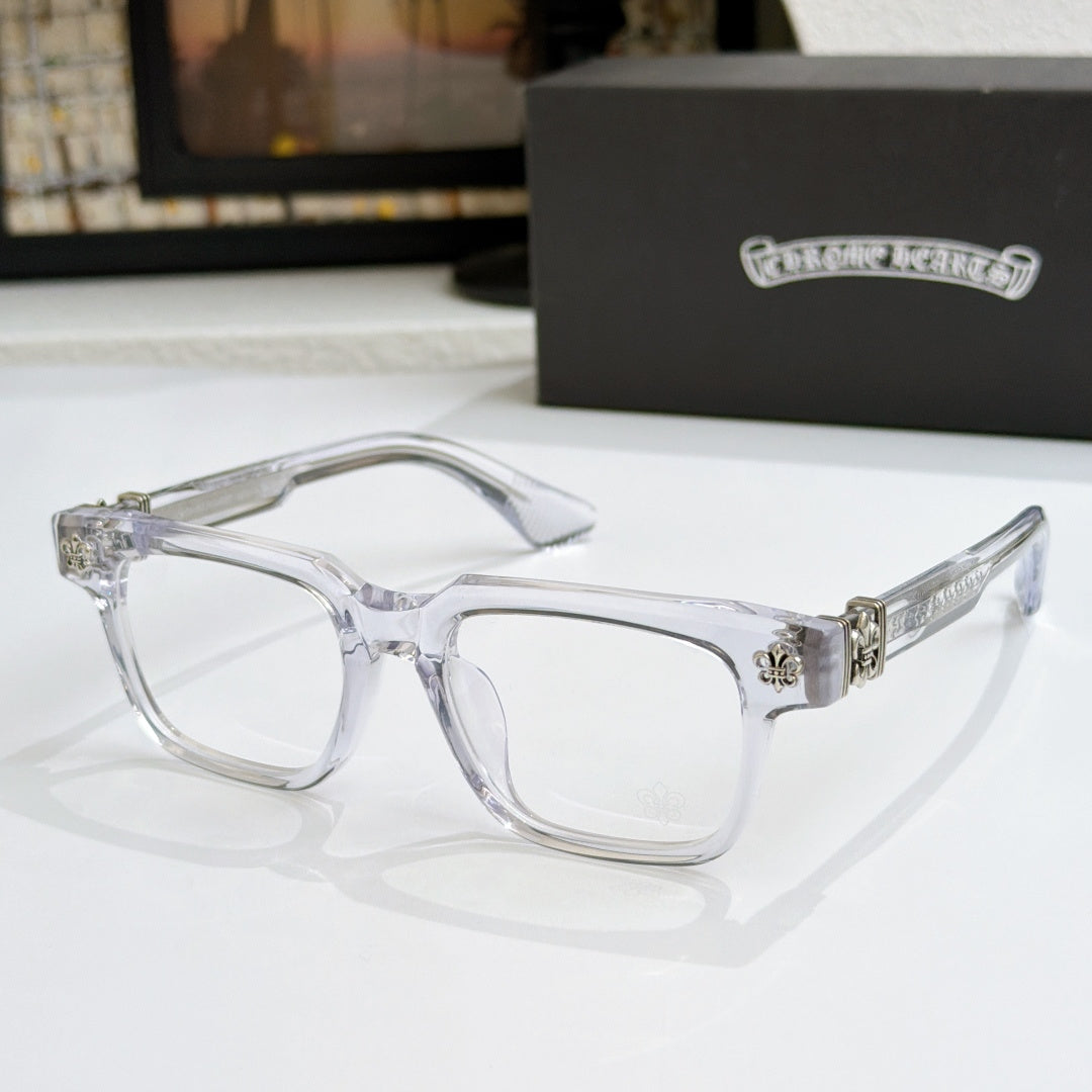 Clear frame chrome eyeglasses with silver-tone arms and fleur-de-lis hinge