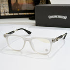 White eyeglass frames with clear lenses, gold details on hinges and temples