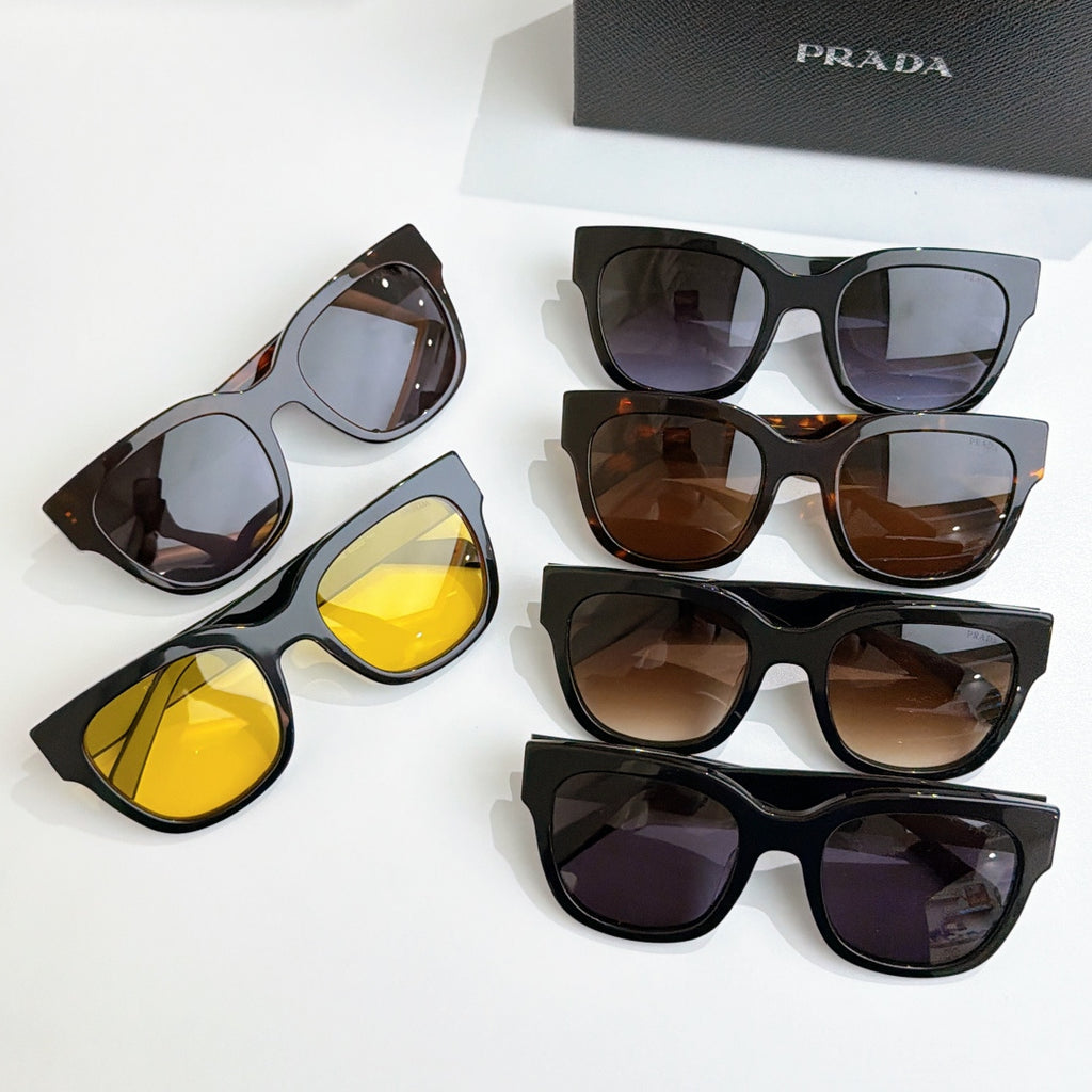Five pairs of PRADA sunglasses with mixed brown, purple, and yellow lenses