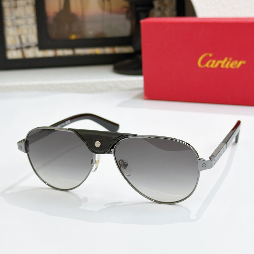 Cartier pilot sunglasses with black frames and dark gray lenses