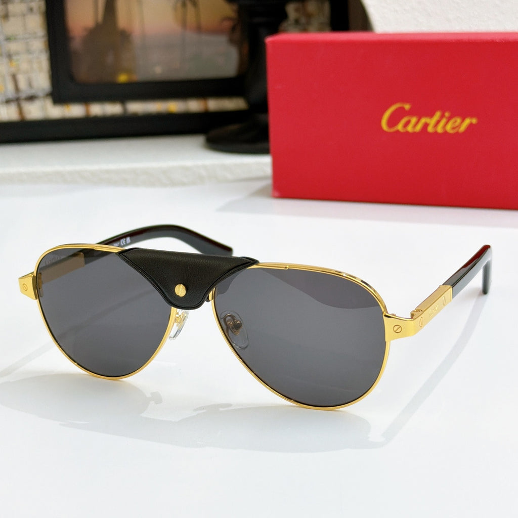 Cartier pilot sunglasses with dark lenses, black frames and gold-tone rims