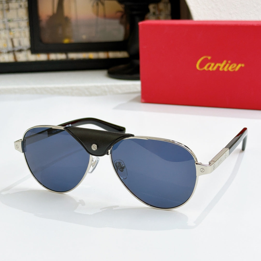 Cartier pilot sunglasses with black frames and blue-tinted lenses, metal hinges