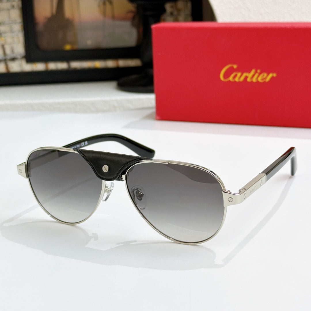 Cartier pilot sunglasses with black frames and light gray lenses, gold-tone rim