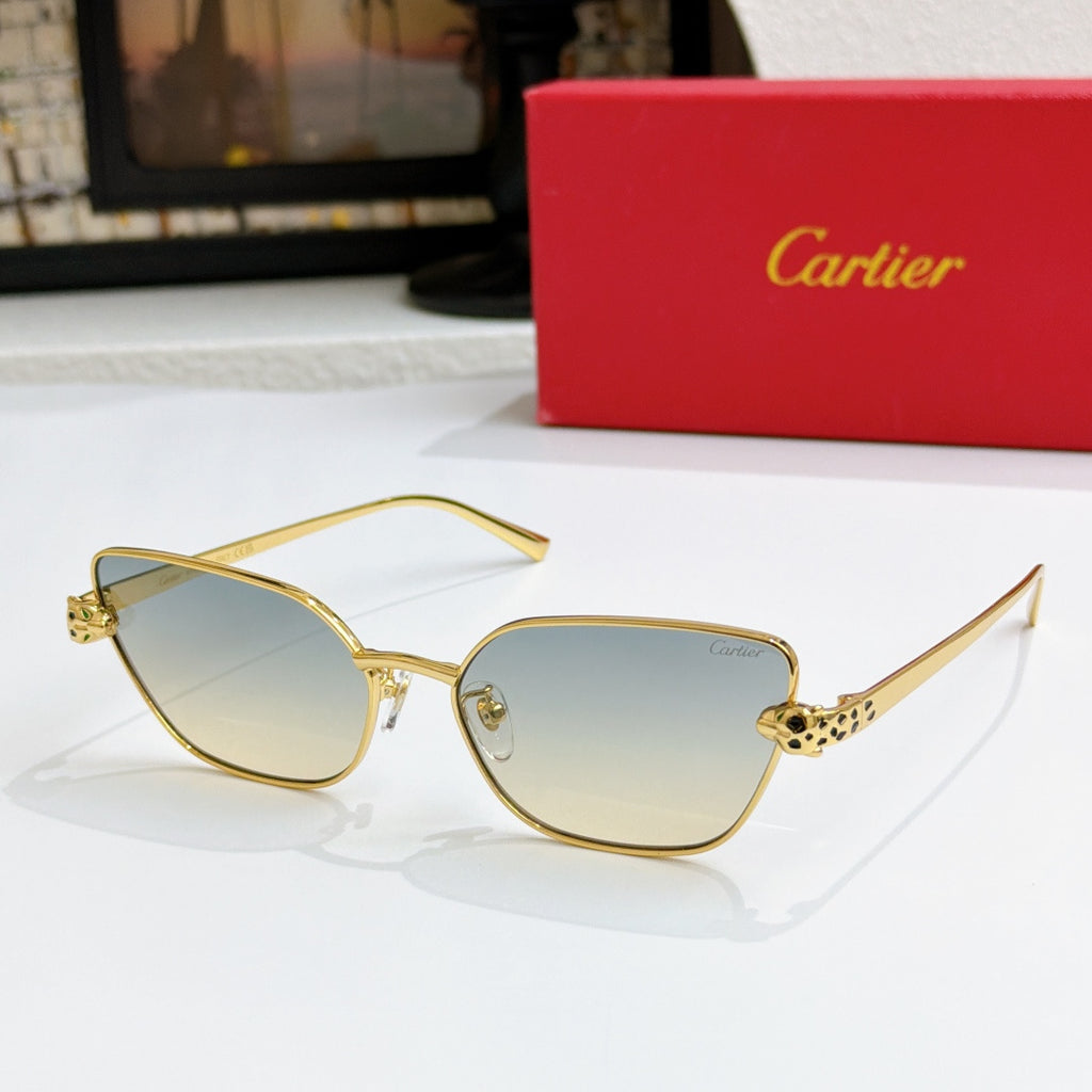 Gold-tone cat-eye sunglasses with light gradient lenses and textured temple detail