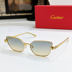 Gold-tone cat-eye sunglasses with light gradient lenses and textured temple detail
