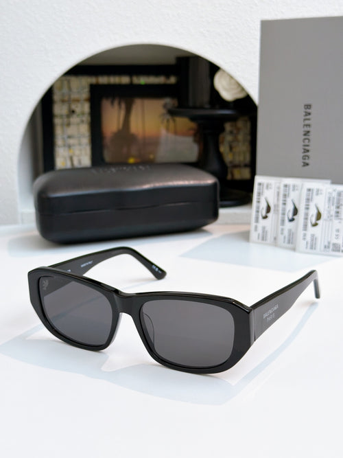 Balenciaga dark square sunglasses with gray lenses and black temple details