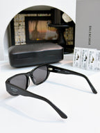 Balenciaga black square sunglasses with gray lenses and etched side logos