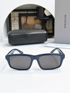 Balenciaga navy blue square sunglasses with dark tinted lenses and thick arms