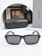 Balenciaga black square sunglasses with dark lenses and thick temples