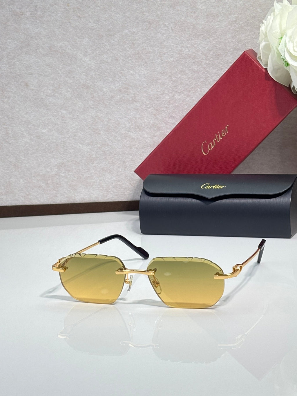Cartier sunglasses with yellow lenses and gold frame