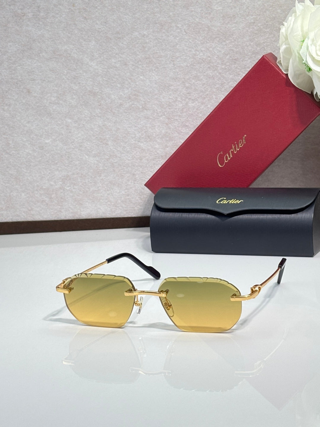 Cartier sunglasses with yellow lenses and gold frame