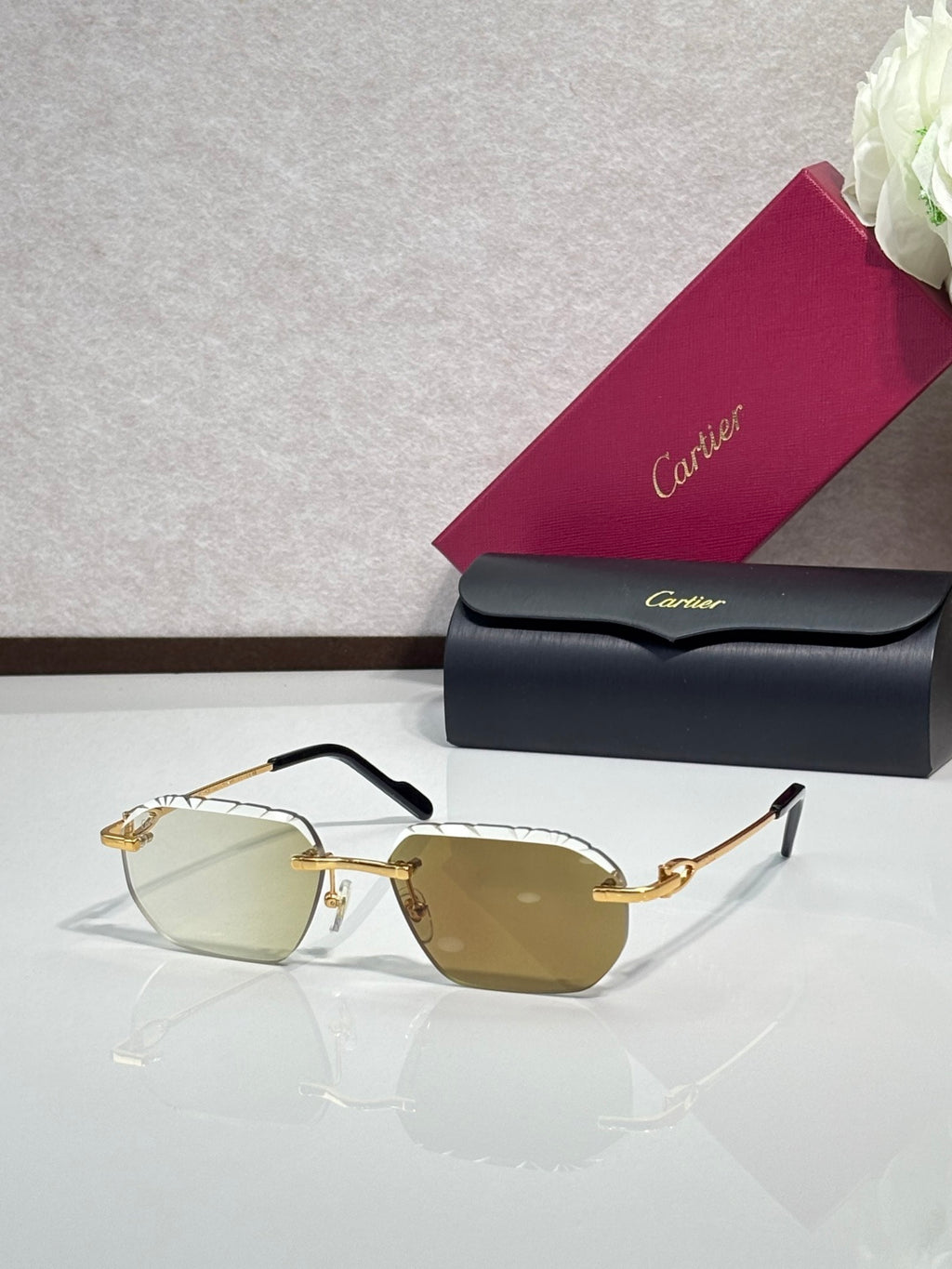 Cartier sunglasses with amber lenses and gold frame