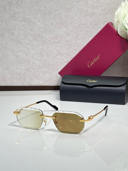 Cartier sunglasses with amber lenses and gold frame