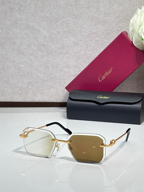 Gold metal-framed eyeglasses with brown tinted lenses
