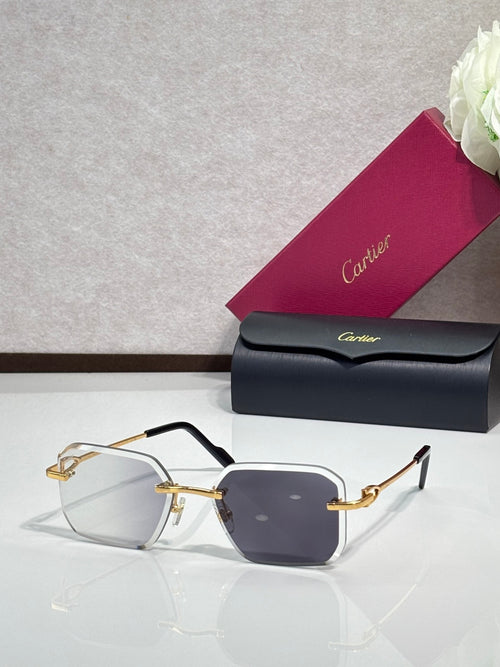 Gold metal-framed eyeglasses with dark purple tinted lenses