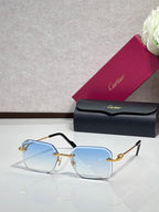 Gold metal-framed eyeglasses with blue tinted lenses