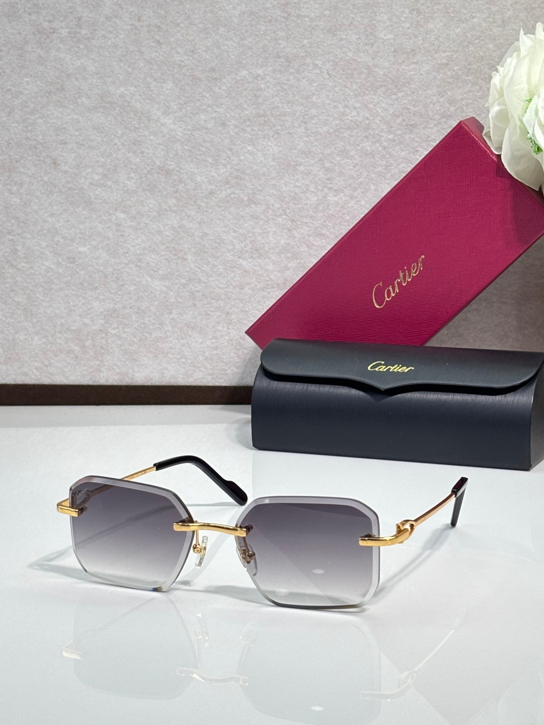Gold metal-framed eyeglasses with gray tinted lenses