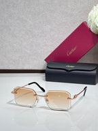 Rose gold metal-framed eyeglasses with beige tinted lenses