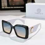 Versace sunglasses with black square frames and light-tinted lenses, gold logo detail