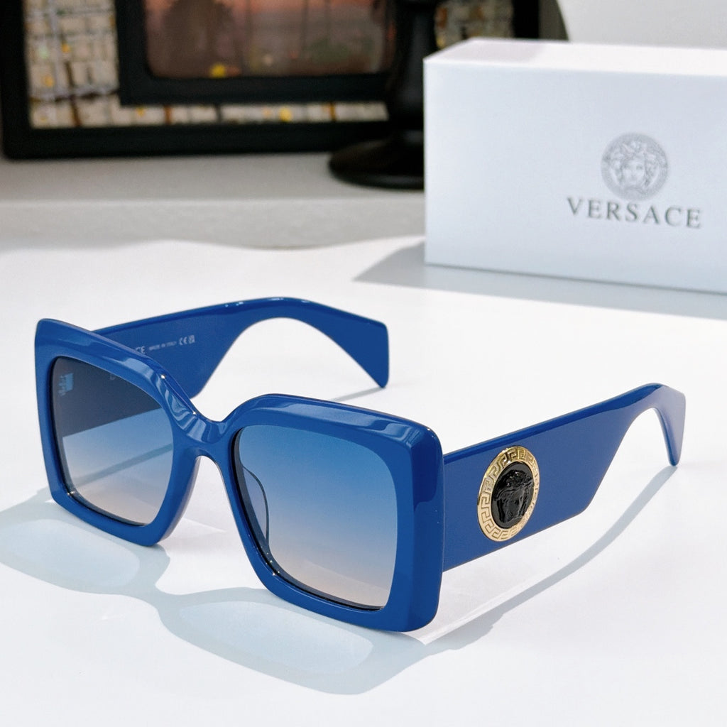 Versace sunglasses with blue square frames and tinted lenses, gold logo detail on temple