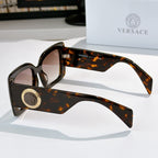 Versace sunglasses side view with tortoiseshell square frame and gold logo temple medallion
