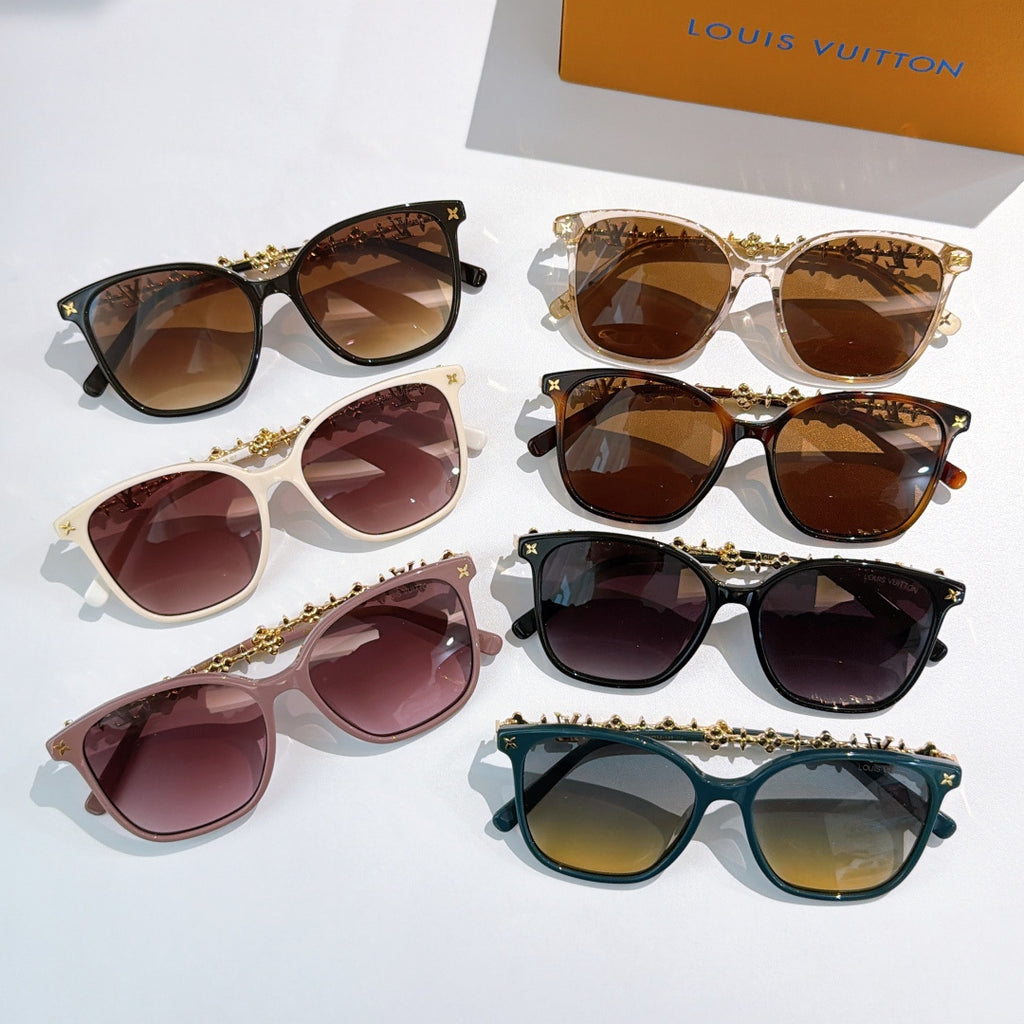 Louis Vuitton sunglasses set with gold chain temples and tinted lenses, multiple colors