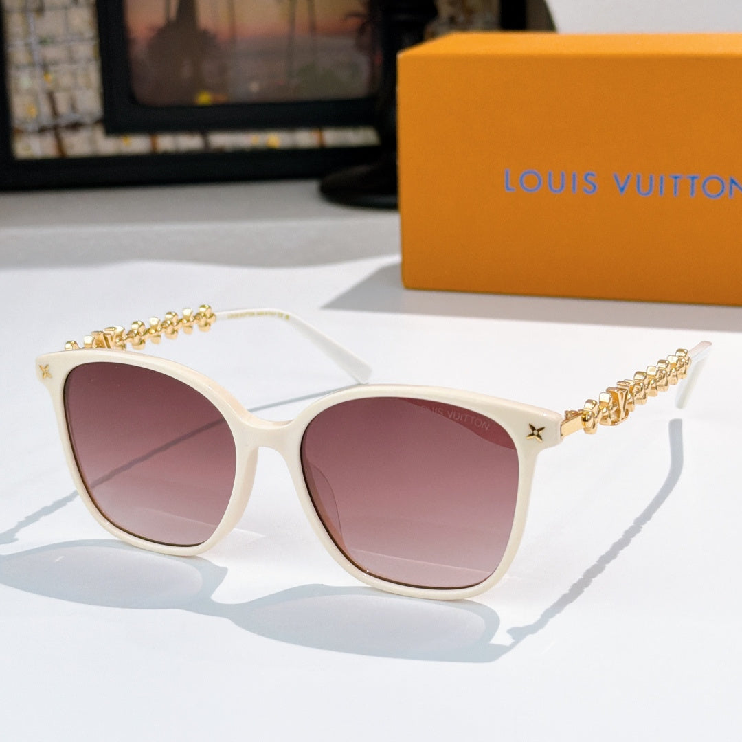 Louis Vuitton sunglasses with white frames, gold chain temples, pink tinted lenses