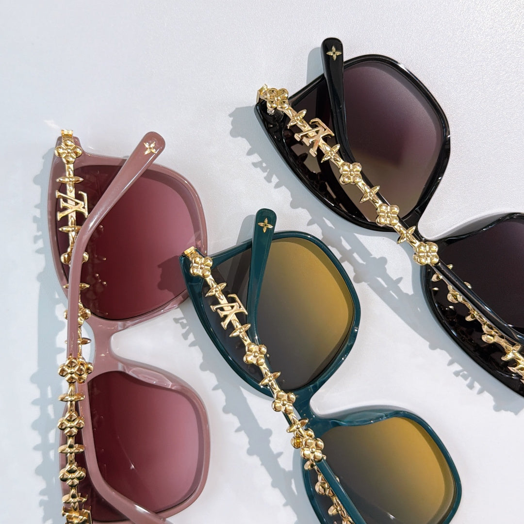 Louis Vuitton sunglasses with gold chain temples and tinted lenses, assorted colors