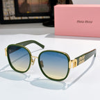 MiuMiu cat-eye sunglasses with dark green frame and blue tinted lenses, gold accents